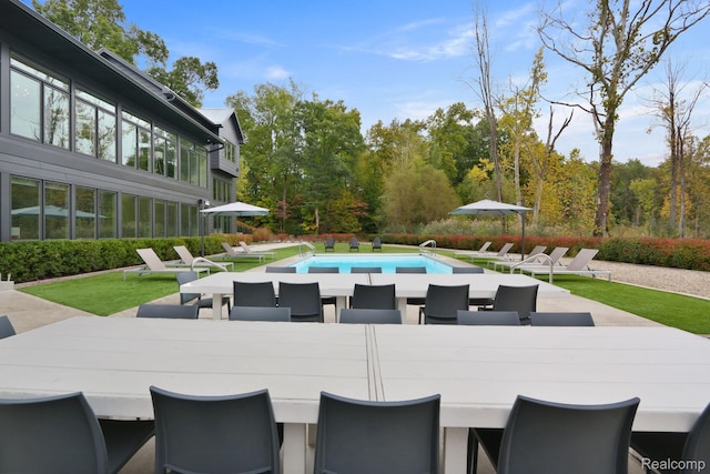 10630 Garr Rd, Berrien Springs, MI 49103 - view of patio with an outdoor pool and outdoor dining space