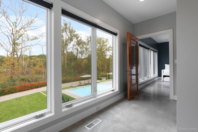 10630 Garr Rd, Berrien Springs, MI 49103 - hallway featuring concrete flooring and plenty of natural light