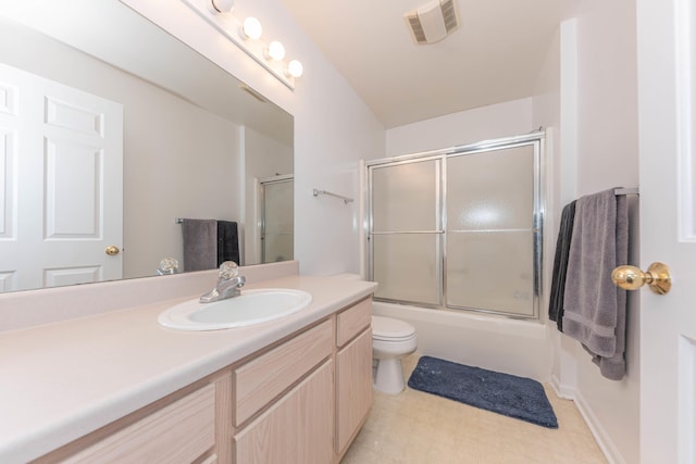 1005 E Duncan St Unit 2D, Manchester, MI 48158 - full bathroom featuring combined bath / shower with glass door, visible vents, vanity, and toilet