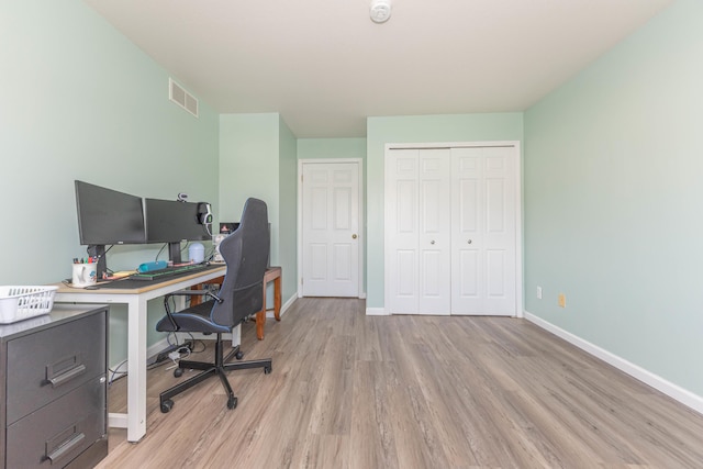 1005 E Duncan St Unit 2D, Manchester, MI 48158 - office with light wood finished floors, baseboards, and visible vents