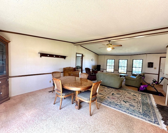 1877 S Almont Ave, Imlay City, MI 48444 - carpeted dining area featuring ceiling fan, lofted ceiling, ornamental molding, and a textured ceiling