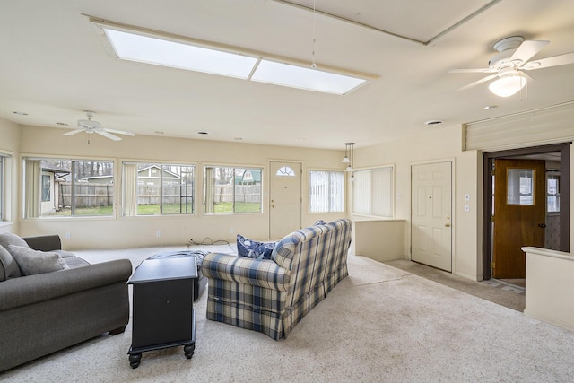 4302 Lake Dr, Beaverton, MI 48612 - carpeted living room with ceiling fan