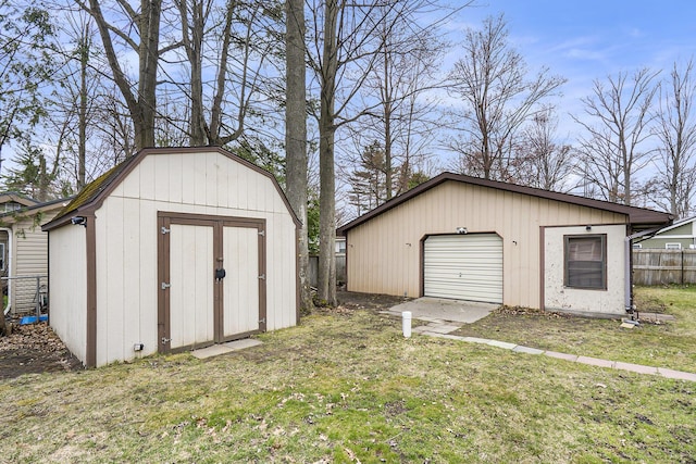 4302 Lake Dr, Beaverton, MI 48612 - view of outdoor structure featuring an outdoor structure and fence
