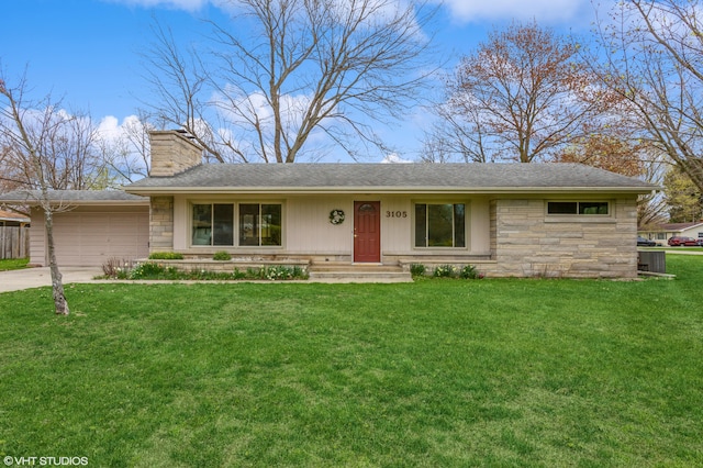 3105 Kevin St, Saint Joseph, MI 49085 - ranch-style home with an attached garage, stone siding, a front lawn, and concrete driveway