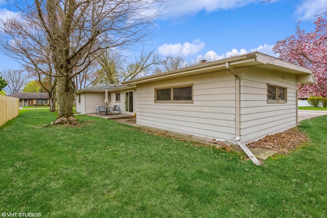 3105 Kevin St, Saint Joseph, MI 49085 - back of house with a yard and a patio