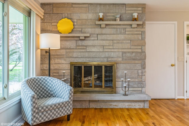 3105 Kevin St, Saint Joseph, MI 49085 - interior details with baseboards, wood finished floors, and a fireplace
