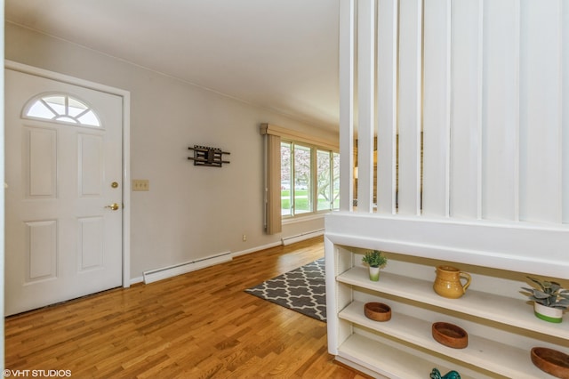 3105 Kevin St, Saint Joseph, MI 49085 - entryway featuring light wood-style floors, baseboards, and baseboard heating