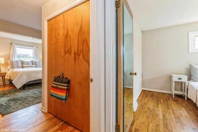 3105 Kevin St, Saint Joseph, MI 49085 - corridor featuring baseboards and wood finished floors