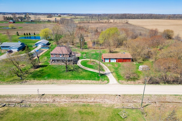 birds eye view of property featuring a rural view