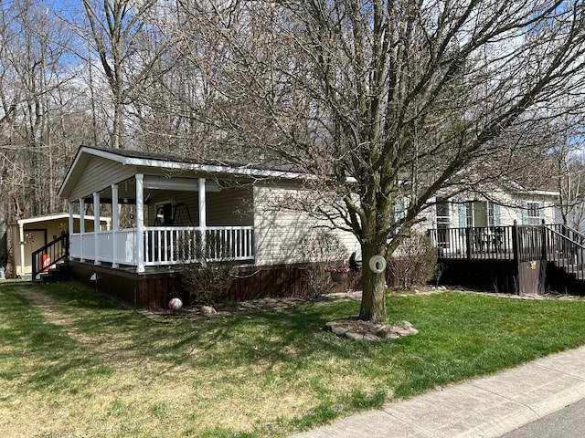 326 Basket Br, Oxford, MI 48371 - exterior space with a porch and a front yard