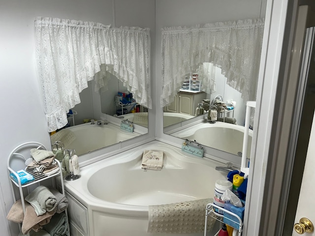 326 Basket Br, Oxford, MI 48371 - bathroom with a garden tub