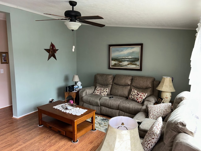 326 Basket Br, Oxford, MI 48371 - living room with wood finished floors, a ceiling fan, baseboards, and ornamental molding