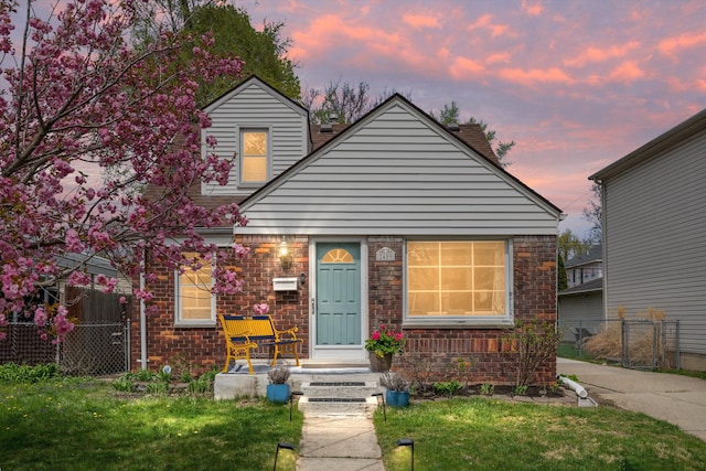 2409 Tufts Ave, Royal Oak, MI 48067 - view of front facade featuring a yard and fence