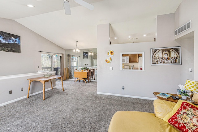 living area with vaulted ceiling, carpet floors, visible vents, and baseboards