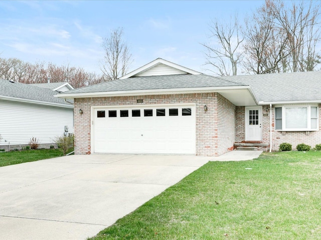 ranch-style home with brick siding, a shingled roof, a garage, a front yard, and concrete driveway