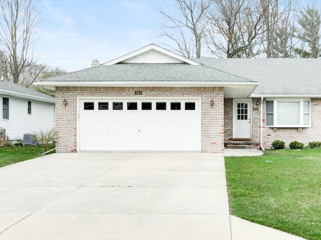 ranch-style house with driveway, a shingled roof, and brick siding