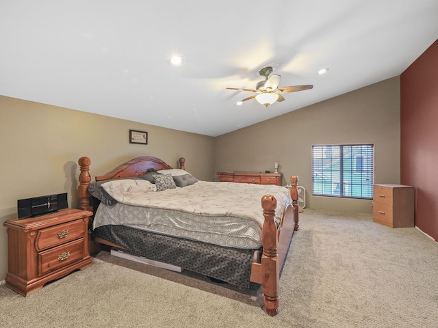 bedroom with recessed lighting, vaulted ceiling, ceiling fan, and light carpet