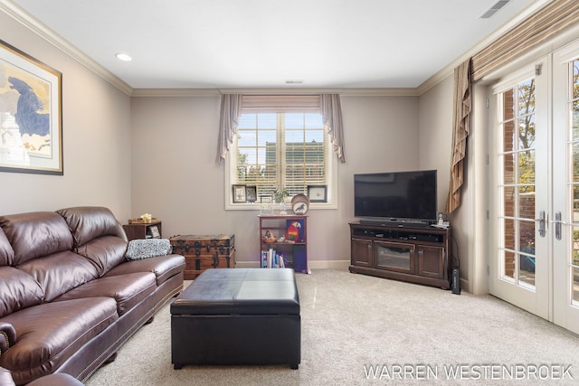 141 Central Ave Unit 110, Holland, MI 49423 - carpeted living area with ornamental molding, visible vents, french doors, and plenty of natural light