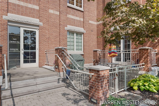 141 Central Ave Unit 110, Holland, MI 49423 - entrance to property with brick siding