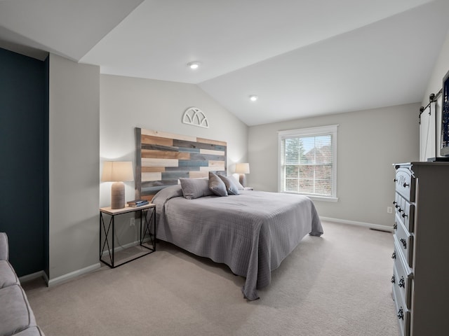 41698 Brownstone Dr, Novi, MI 48377 - bedroom featuring vaulted ceiling, baseboards, and light carpet