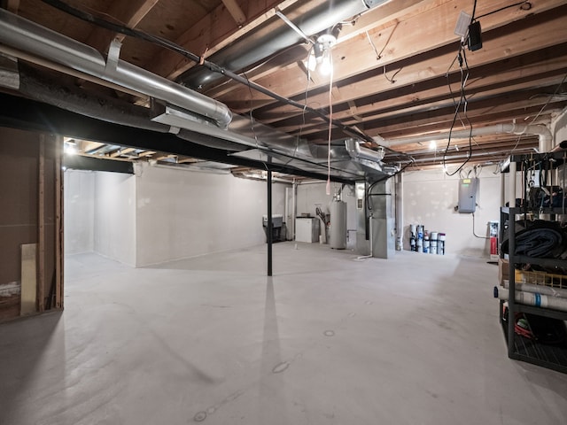 41698 Brownstone Dr, Novi, MI 48377 - unfinished below grade area featuring water heater, heating unit, and electric panel