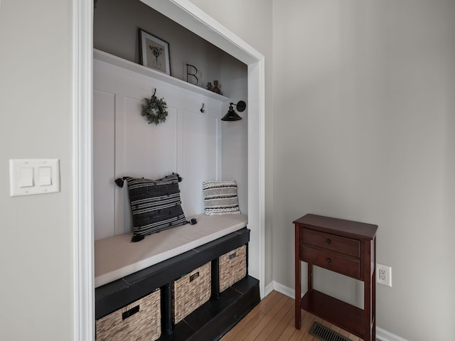 41698 Brownstone Dr, Novi, MI 48377 - mudroom featuring baseboards and wood finished floors