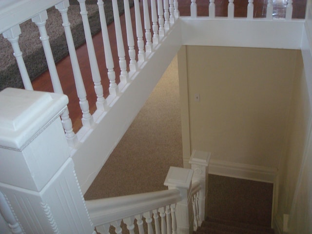stairway with carpet flooring
