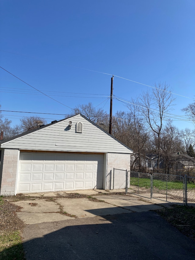detached garage with fence