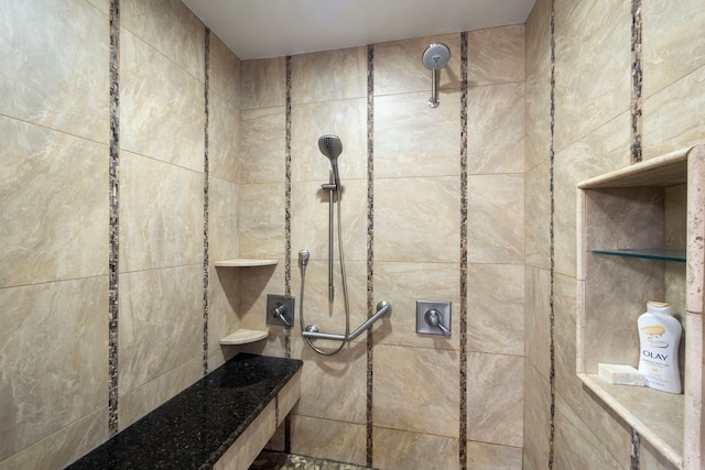 full bathroom with tiled shower