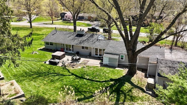 back of property featuring fence, a patio area, a yard, and french doors