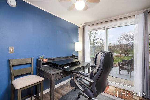 home office with wood finished floors, a ceiling fan, and baseboards