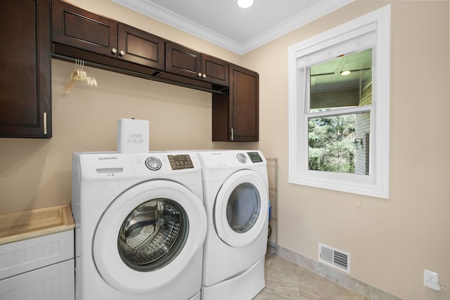 70799 Fisher Rd, Bruce, MI 48065 - washroom with cabinet space, independent washer and dryer, visible vents, baseboards, and ornamental molding