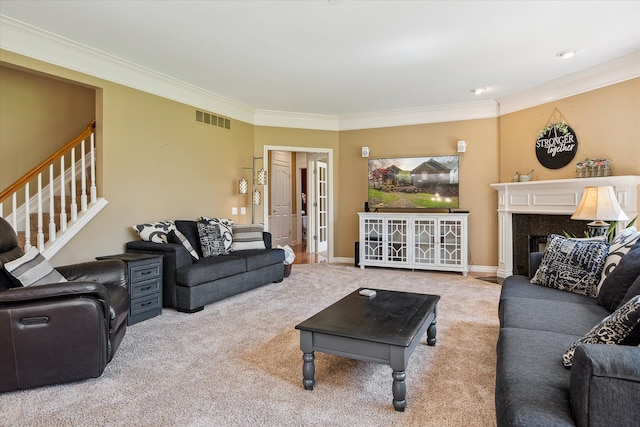 8504 Riverwalk Dr, Fenton, MI 48430 - living room featuring carpet flooring, ornamental molding, stairs, and a fireplace with flush hearth
