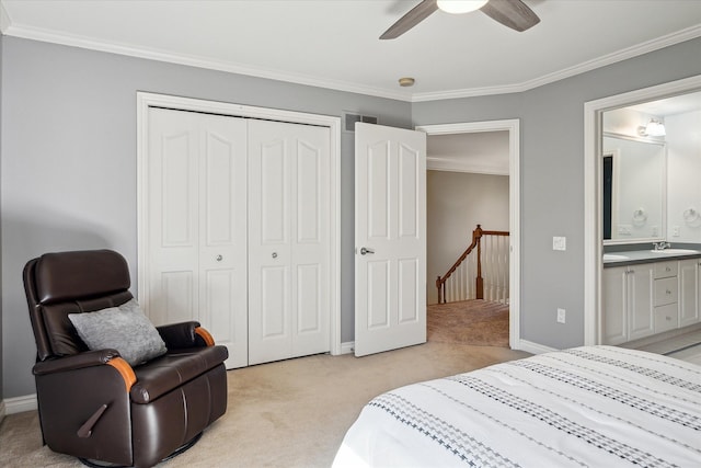 8504 Riverwalk Dr, Fenton, MI 48430 - bedroom with light colored carpet, ornamental molding, a closet, connected bathroom, and a sink