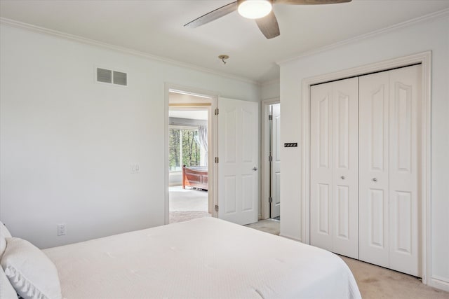 8504 Riverwalk Dr, Fenton, MI 48430 - bedroom featuring light carpet, ornamental molding, a closet, and a ceiling fan