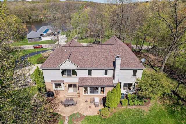 8504 Riverwalk Dr, Fenton, MI 48430 - aerial view of property and surrounding area featuring a forest