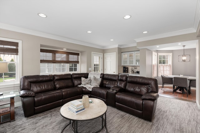 living area featuring recessed lighting, baseboards, crown molding, and carpet