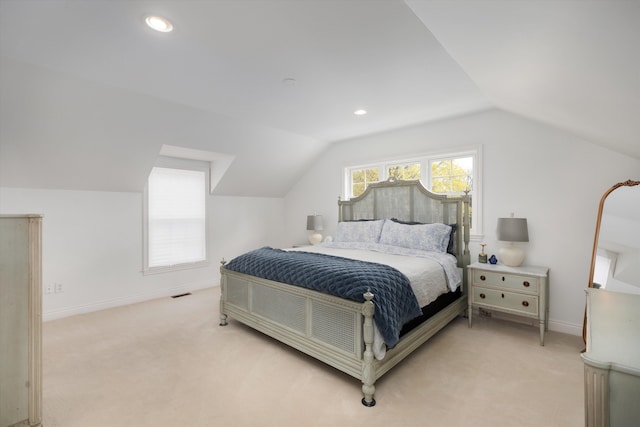 bedroom with lofted ceiling, light colored carpet, baseboards, and recessed lighting