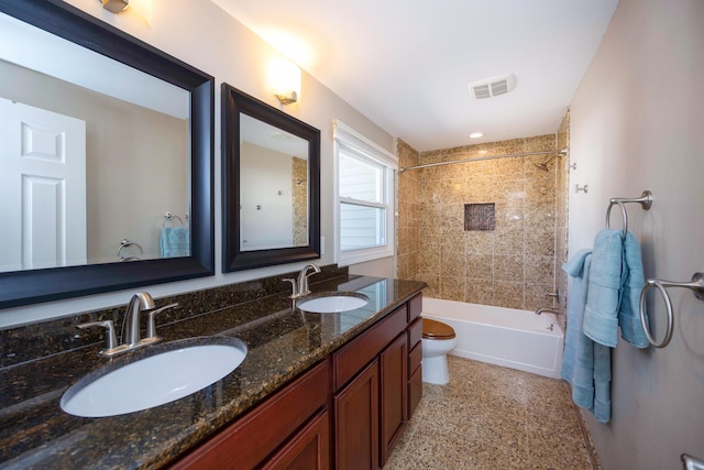 2015 Rugby Ct, Ann Arbor, MI 48103 - full bath featuring toilet, double vanity, and shower / bathtub combination
