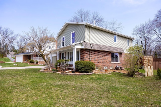 2015 Rugby Ct, Ann Arbor, MI 48103 - view of side of home featuring brick siding, driveway, and a garage
