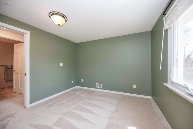 2015 Rugby Ct, Ann Arbor, MI 48103 - unfurnished room with light colored carpet and baseboards