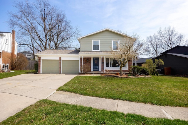 2015 Rugby Ct, Ann Arbor, MI 48103 - traditional-style home featuring a garage, concrete driveway, covered porch, and brick siding