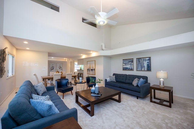 2015 Rugby Ct, Ann Arbor, MI 48103 - living area featuring a towering ceiling, light colored carpet, baseboards, ceiling fan, and recessed lighting