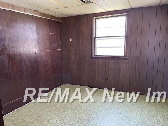 5225 N Vassar Rd, Akron, MI 48701 - interior space featuring wooden walls
