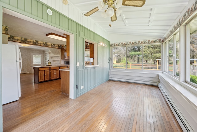 2050 Rowe Rd, Milford, MI 48380 - unfurnished sunroom with a baseboard radiator, baseboard heating, beam ceiling, and ceiling fan