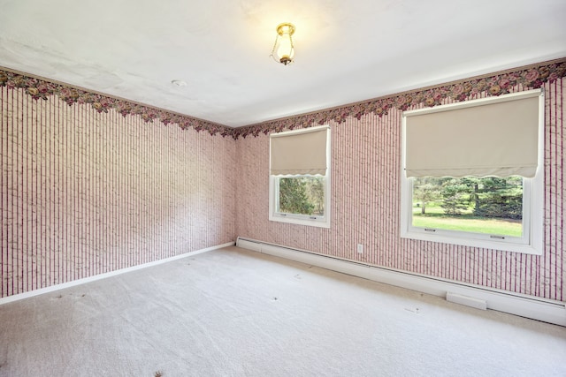 2050 Rowe Rd, Milford, MI 48380 - carpeted empty room featuring wallpapered walls and a baseboard radiator