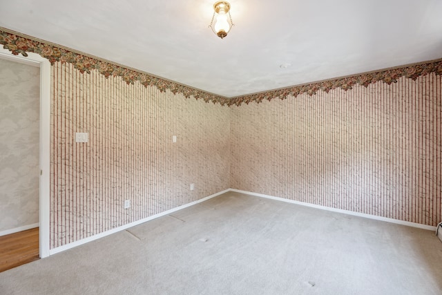 2050 Rowe Rd, Milford, MI 48380 - carpeted spare room with wallpapered walls and baseboards