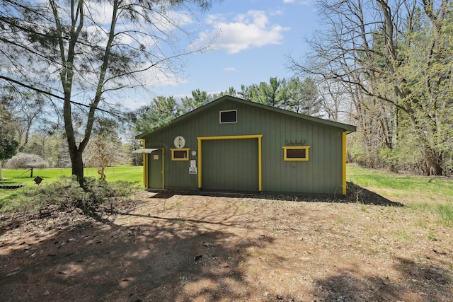 2050 Rowe Rd, Milford, MI 48380 - view of outbuilding featuring an outdoor structure and driveway