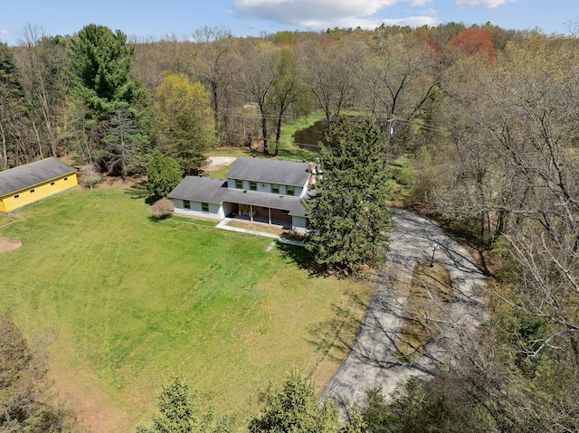 2050 Rowe Rd, Milford, MI 48380 - birds eye view of property featuring a wooded view