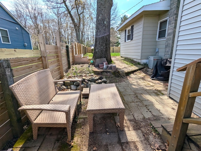 view of patio featuring fence